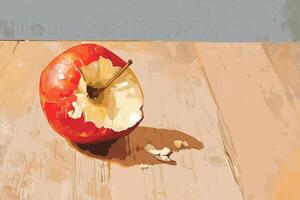 A red apple on a wooden table photo