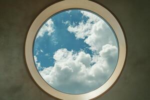 A round window with a view of the sky photo