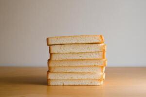 A stack of bread on a table photo