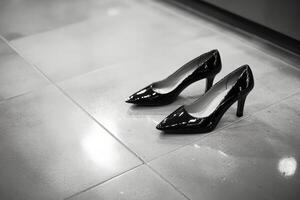 Black and white photo of a pair of high heels