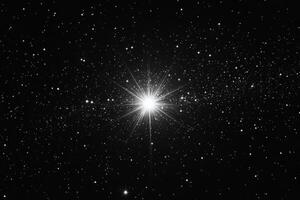 A bright star in the night sky photo
