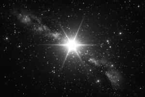 The star is shining brightly in the night sky photo