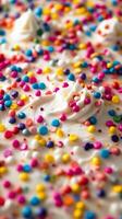 A close up of a cake with frosting and sprinkles photo