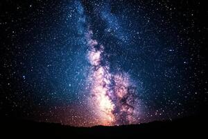 The milky is seen in the night sky photo