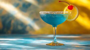 Blue cocktail with lemon and cherry on the rim photo