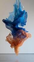 A large blue and orange cloth sculpture in the air photo