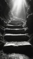 A black and white photo of stairs leading into a cave