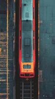 A red train on the tracks photo