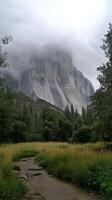 A mountain with a trail leading to it photo