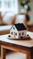 House model on table in living room photo