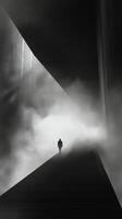 A man walks down a staircase in a foggy room photo