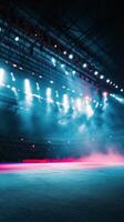 An empty stadium with lights and smoke photo