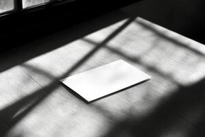 A blank piece of paper sitting on a table photo