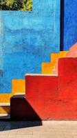 A red, yellow, and blue wall photo