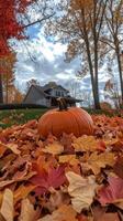 A pumpkin sitting on the ground in front of a house photo