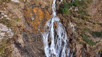 Aerial view of a waterfall around the Albula Pass in Grisons, Switzerland video