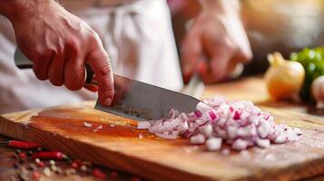 A person cutting onions on a cutting board photo