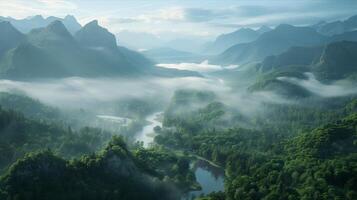 A river runs through a forest and mountains photo