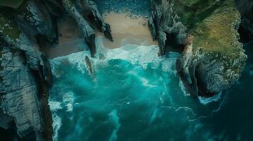 An aerial view of a beach and cliffs photo