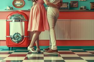 A couple standing in front of a jukebox photo