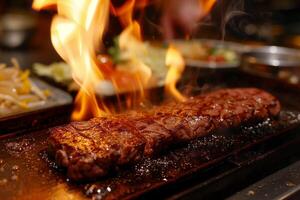A large steak being cooked on a grill photo