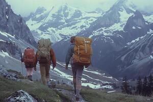 Three people with backpacks walking up a mountain photo
