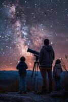 A family looking at the milky with a telescope photo