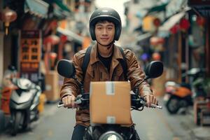 A young man on a motorcycle with a box on his back photo