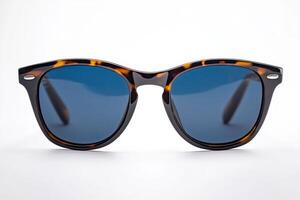 Elegant Tortoise Shell Sunglasses with Blue Lenses photo