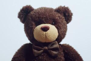 Charming Brown Teddy Bear with Bow Tie photo