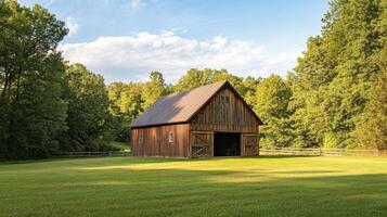 Rustic Wooden Barn in a Serene Countryside Landscape photo