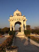 A white building with a white dome photo