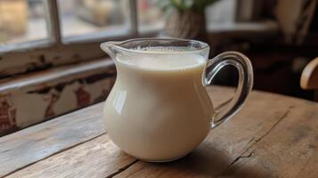 Creamy Milk in a Glass Pitcher photo