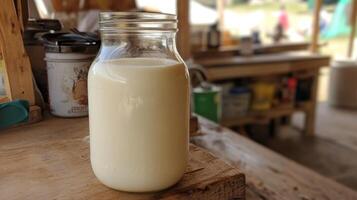 Fresh Dairy Milk in a Glass Jar photo