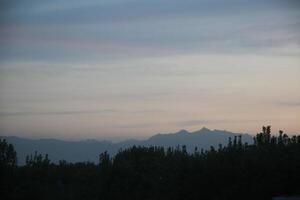 A view of mountains from a distance photo