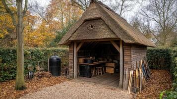 Charming Thatched Cottage Shed in Autumn Garden photo