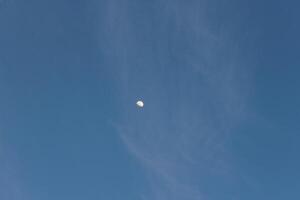 A plane flying in the blue sky photo