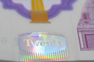 Holographic Security Feature on Twenty-Pound Note Detail photo