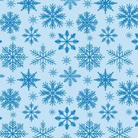 Snowflakes pattern on a blue background. vector