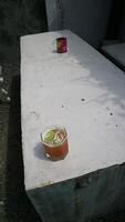 a drink on a table photo