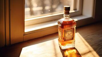 windowsill empty whiskey bottle photo