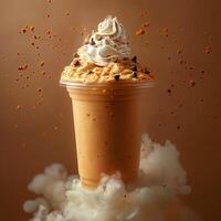 Delicious creamy beverage topped with whipped cream and chocolate chips photo