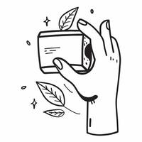 Hand holding a cut leaf with eco friendly products concept as A hand holding a cut leaf with eco friendly products in the background promoting green products and corporate social r Dynamics vector