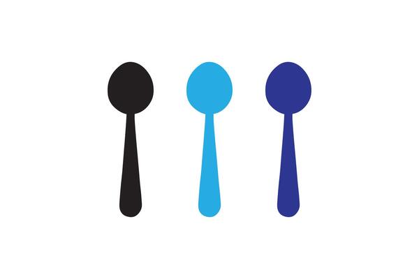 Three spoons with different colors on a white background