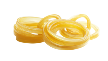 Colorful yellow rubber bands arranged in a cluster on a white background showcasing their flexibility and texture png