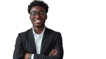 Smiling young man in formal attire posing confidently with crossed arms in a bright studio setting png