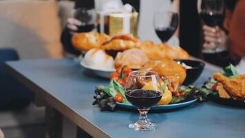 A table with food and wine on it video