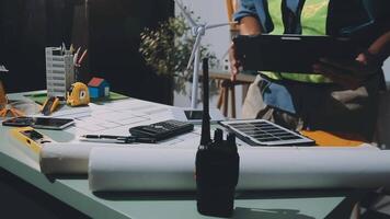 A man is working on a project at a desk video
