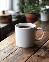 Clean white ceramic coffee mug on wooden table with natural light photo