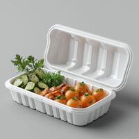 Fresh food container with vegetables and herbs, perfect for meal prep photo